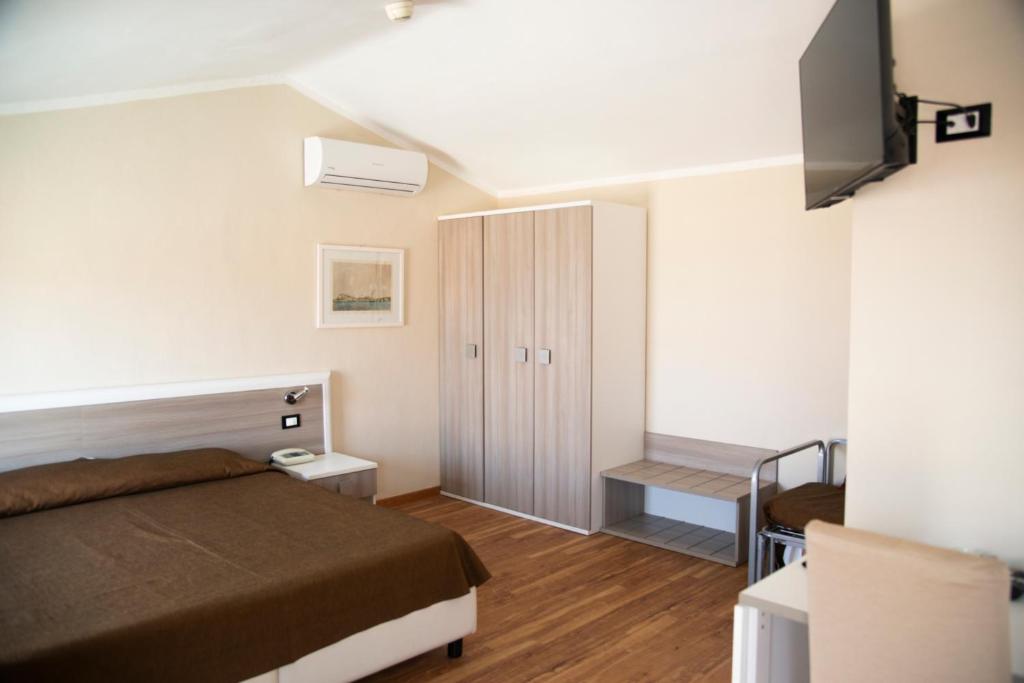 TV a/nebo společenská místnost v ubytování Hotel Fabricia