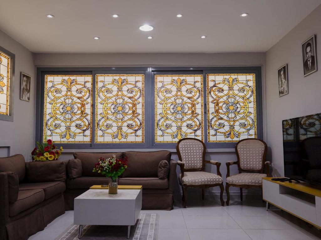TV a/nebo společenská místnost v ubytování Zamalek House Hotel