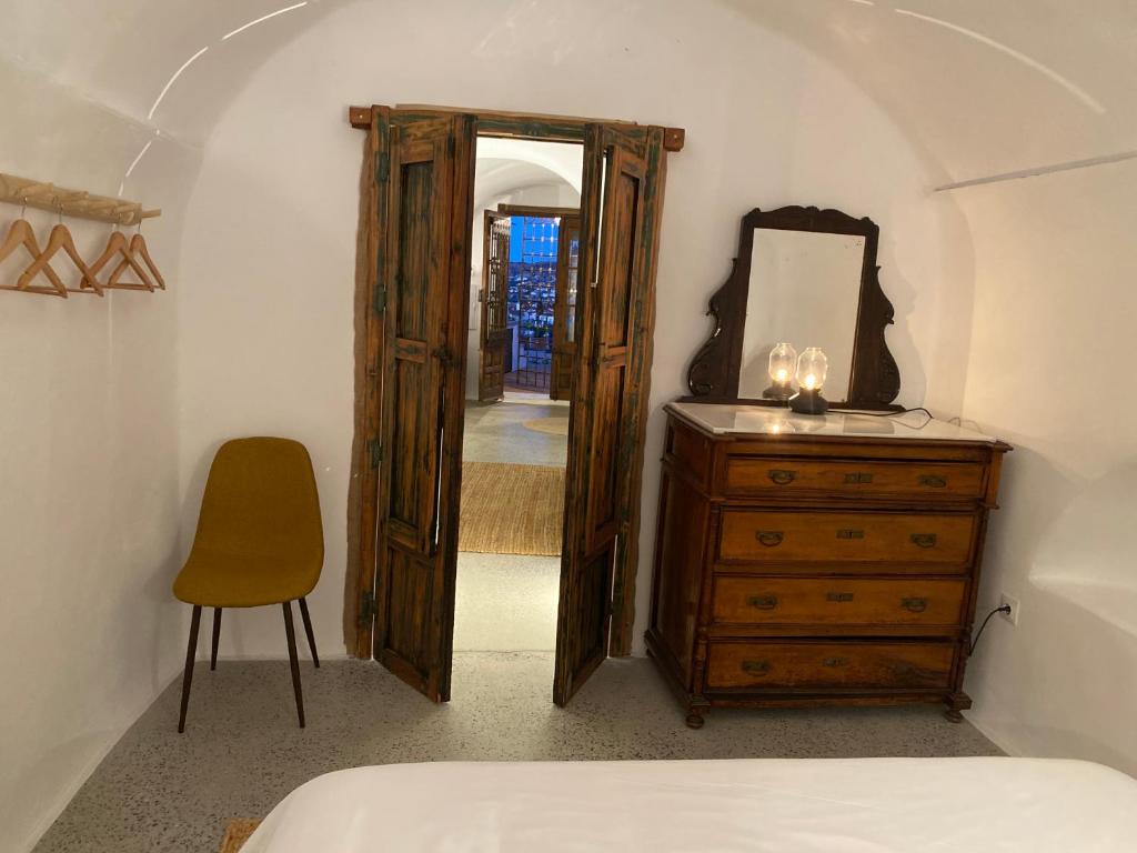 Postel nebo postele na pokoji v ubytování Cuevas Oro y Arcilla