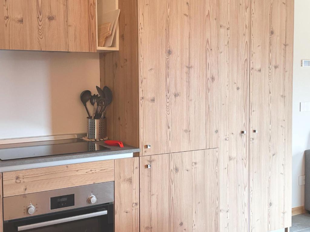 Kuchyň nebo kuchyňský kout v ubytování Chalet immerso nel verde