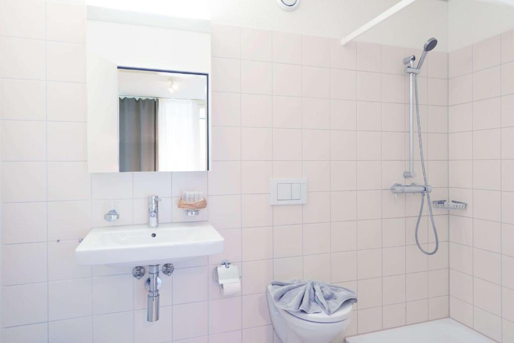 Koupelna v ubytování HITrental Allmend Comfort Apartments