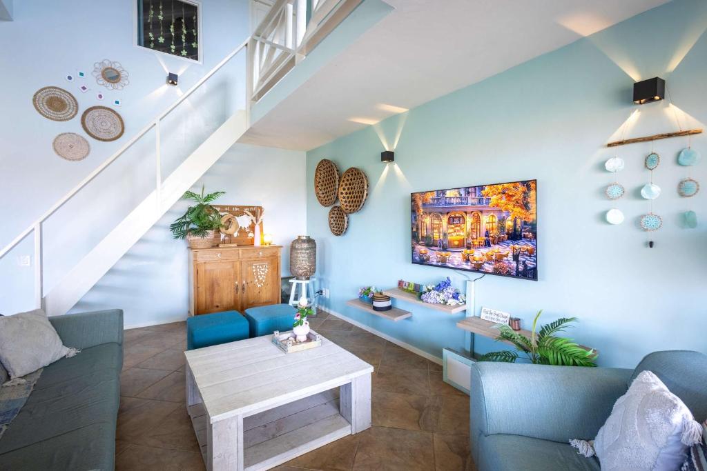 Posezení v ubytování MasBango Luxury Penthouse at Jan Thiel
