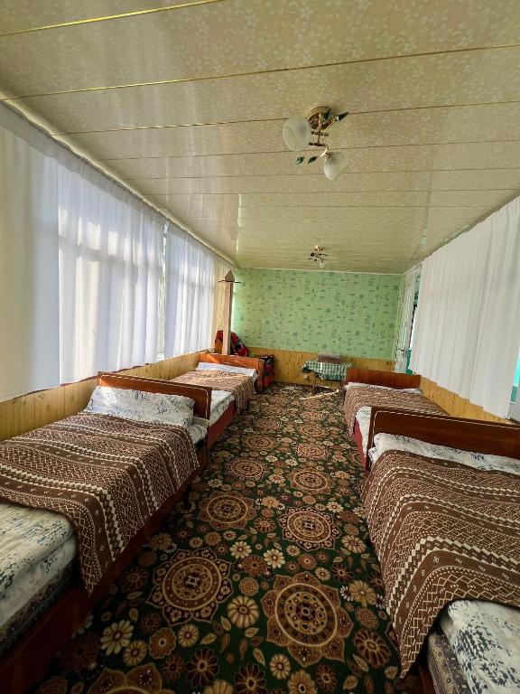 Happy Family Guest House - Quadruple Room With Mountain View