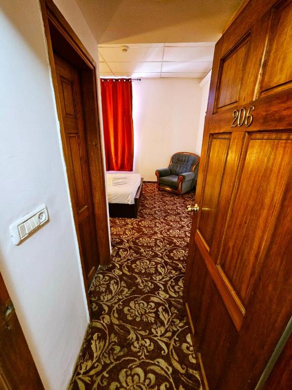 Postel nebo postele na pokoji v ubytování Zion Hotel