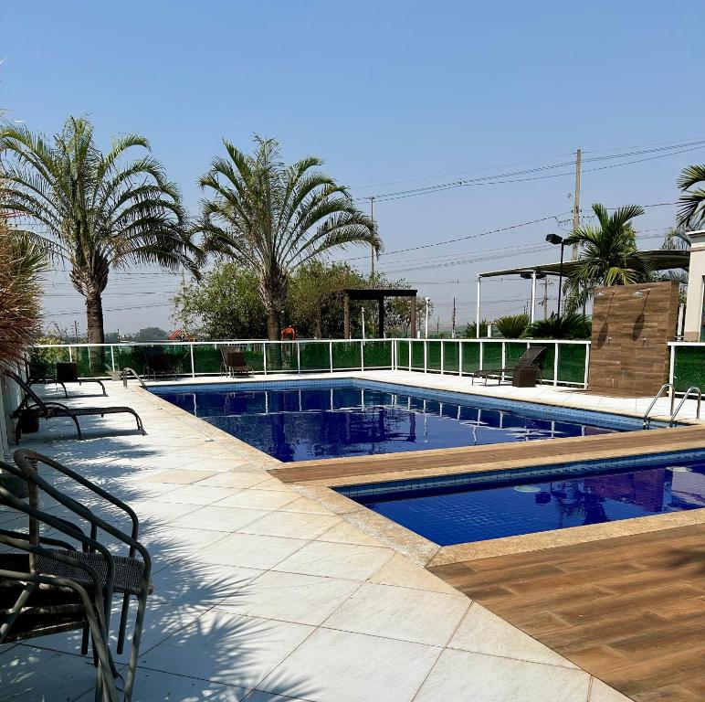 Bazén v ubytování Ap Completo vista para rua ArCond WiFi Piscina nebo v jeho okolí
