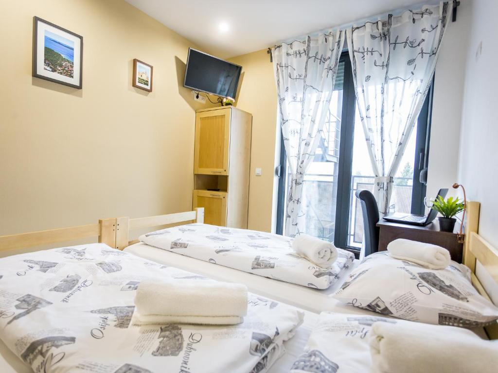 Postel nebo postele na pokoji v ubytování Hostel Moving