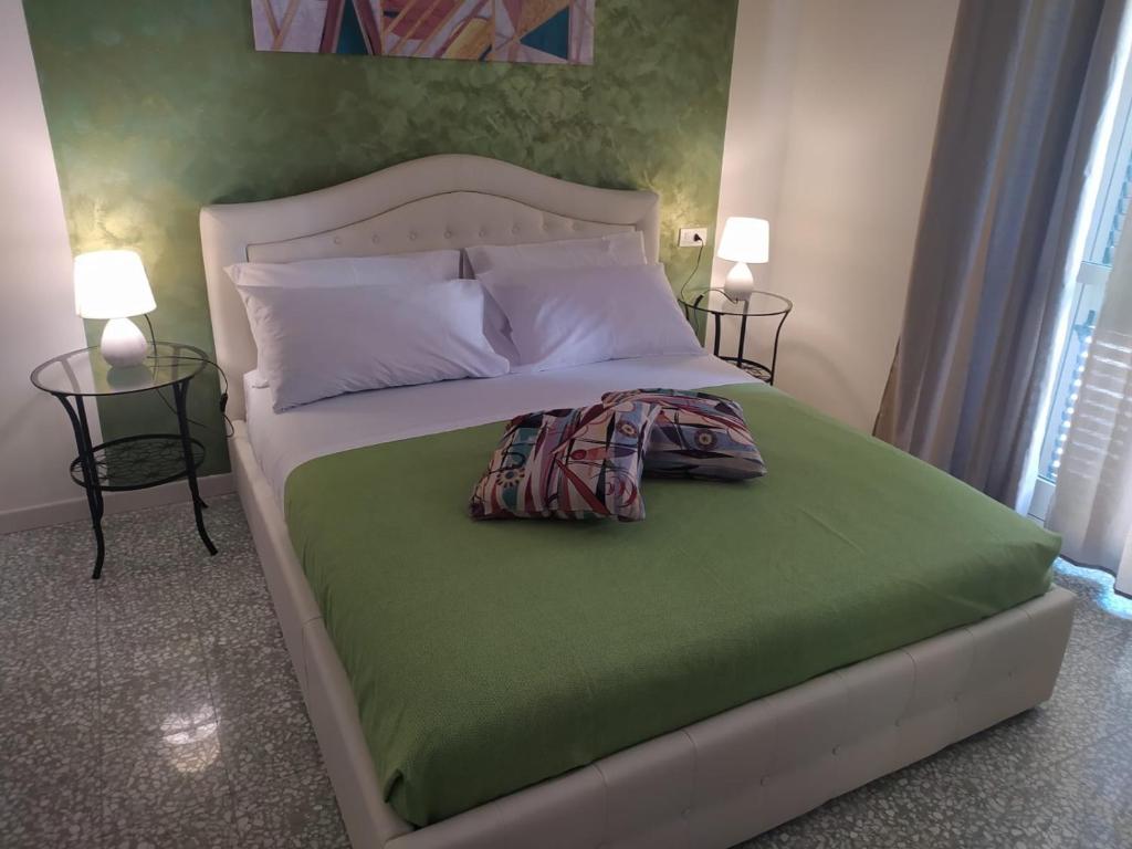 Postel nebo postele na pokoji v ubytování B&B La Scalina
