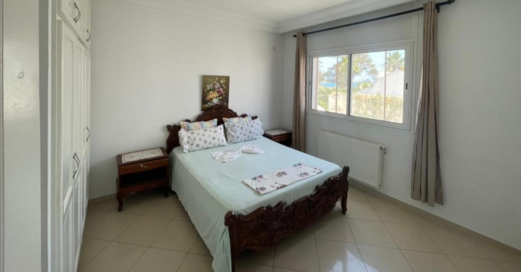 Postel nebo postele na pokoji v ubytování Appartement Monaco