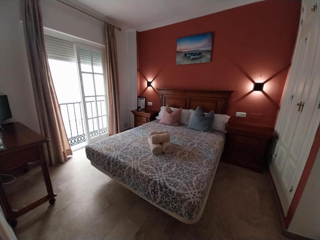 Postel nebo postele na pokoji v ubytování Hostal Montys