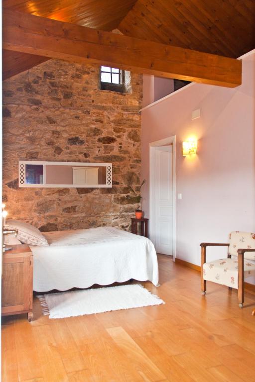 Cama o camas de una habitación en Casa Rural Graña da Acea