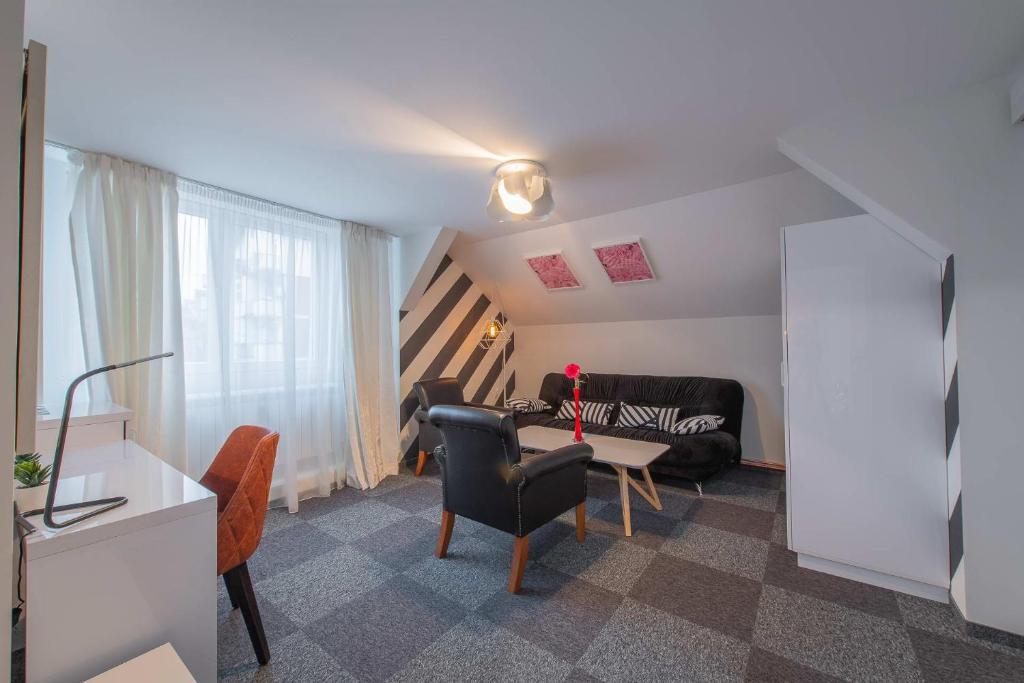Posezení v ubytování Apartmani Maximilian