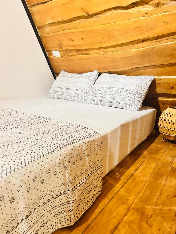 Postel nebo postele na pokoji v ubytování Hotel en Huacas y Brasilito