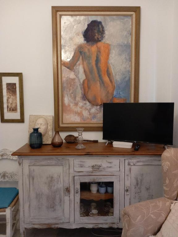 A television and/or entertainment centre at Apartamento Santa Cruz