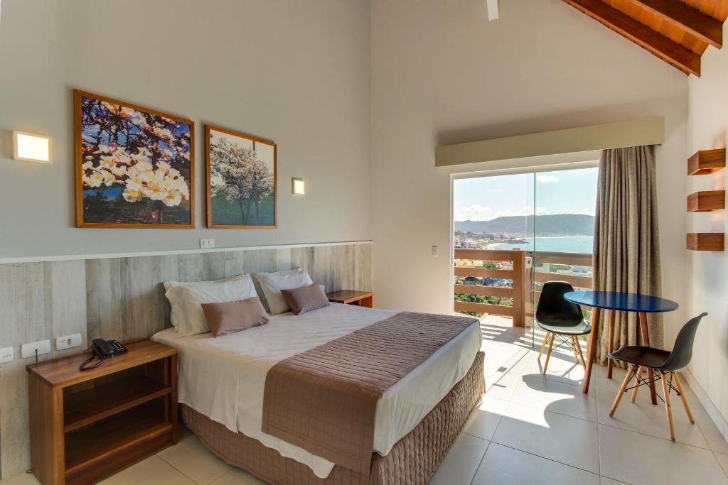 Cama ou camas em um quarto em Pousada do Arvoredo