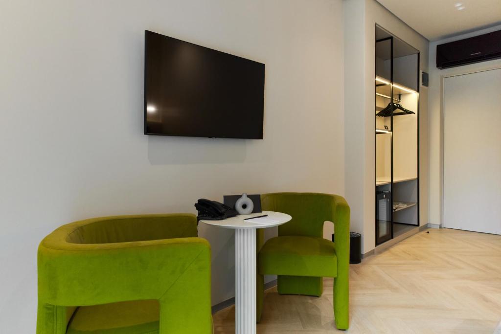 TV a/nebo společenská místnost v ubytování Hotel Laudon