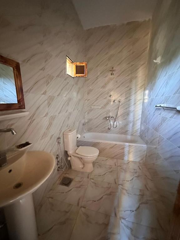 Koupelna v ubytování Nour El Waha Hotel