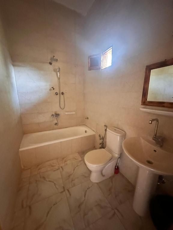 Koupelna v ubytování Nour El Waha Hotel