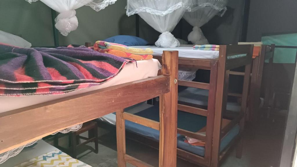 Postel nebo postele na pokoji v ubytování Ruby - Casa de Hospedes - Backpackers