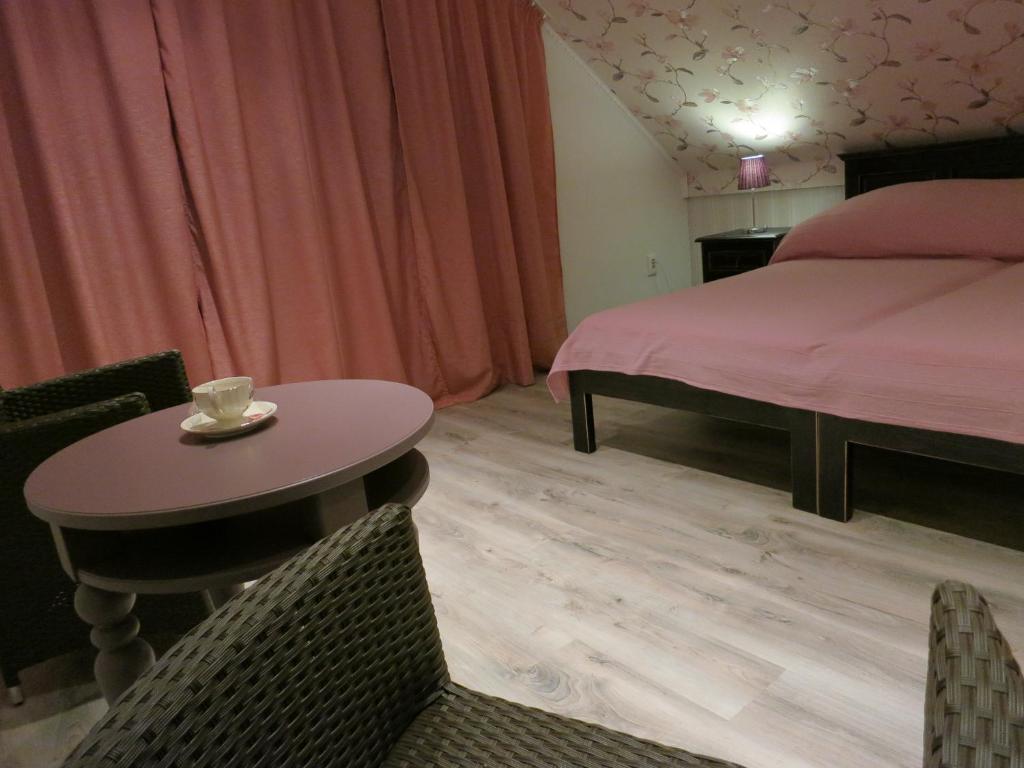 Postel nebo postele na pokoji v ubytování Vilka Relax