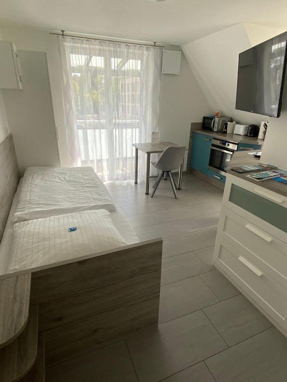 Kuchyň nebo kuchyňský kout v ubytování hochwertiges Studio in bester Lage