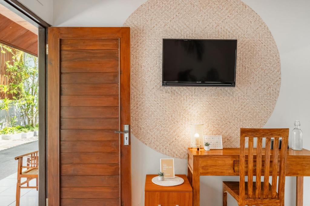 TV a/nebo společenská místnost v ubytování Cove Arganta