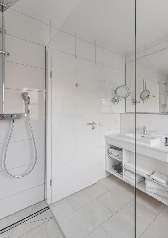 Koupelna v ubytování Hotel Caraleon