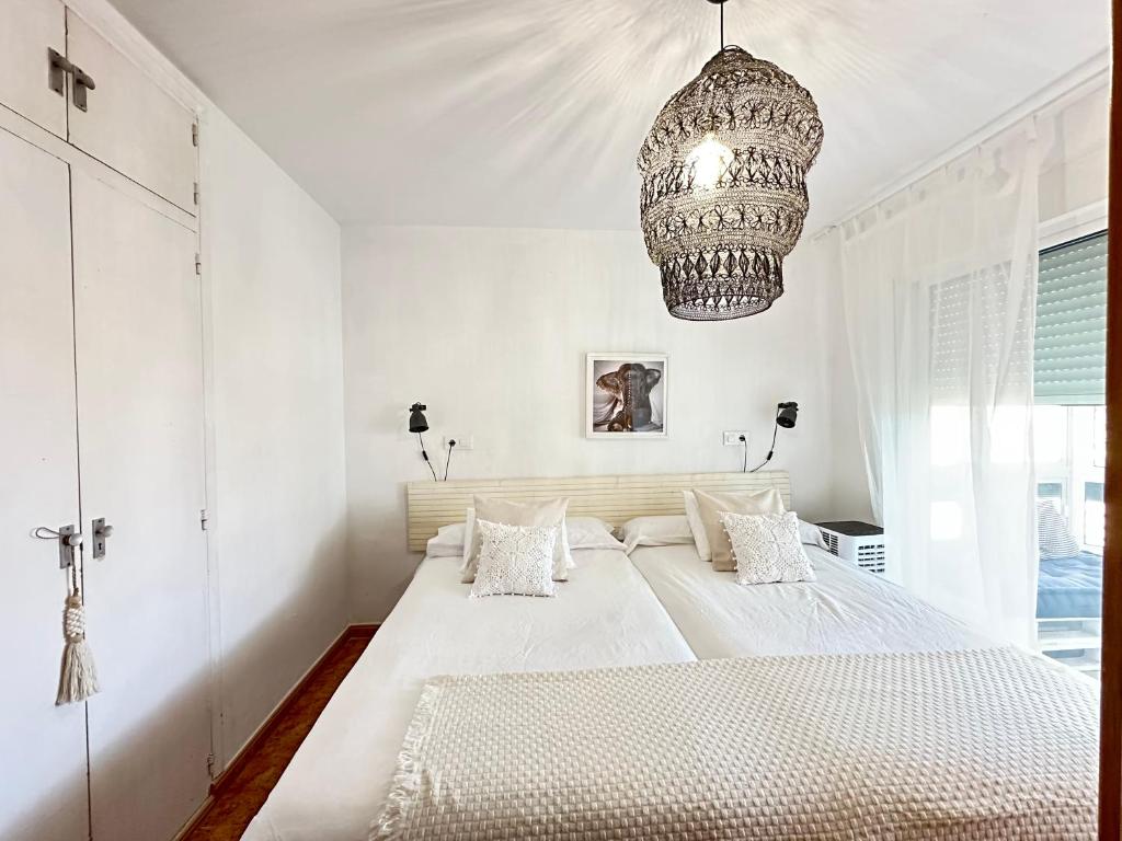 Posteľ alebo postele v izbe v ubytovaní Charming & cosy beach apartment