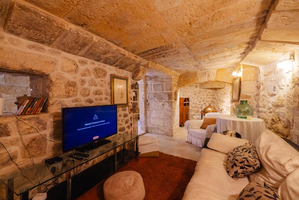 TV a/nebo společenská místnost v ubytování Tranquility Haven