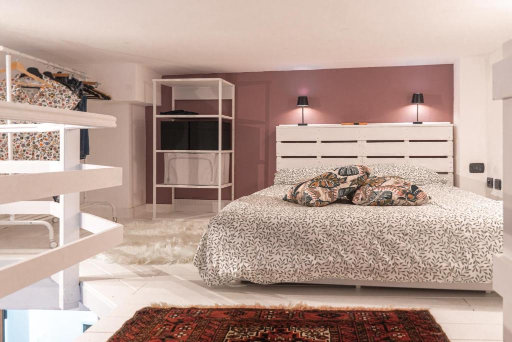 Postel nebo postele na pokoji v ubytování Casa di Cla