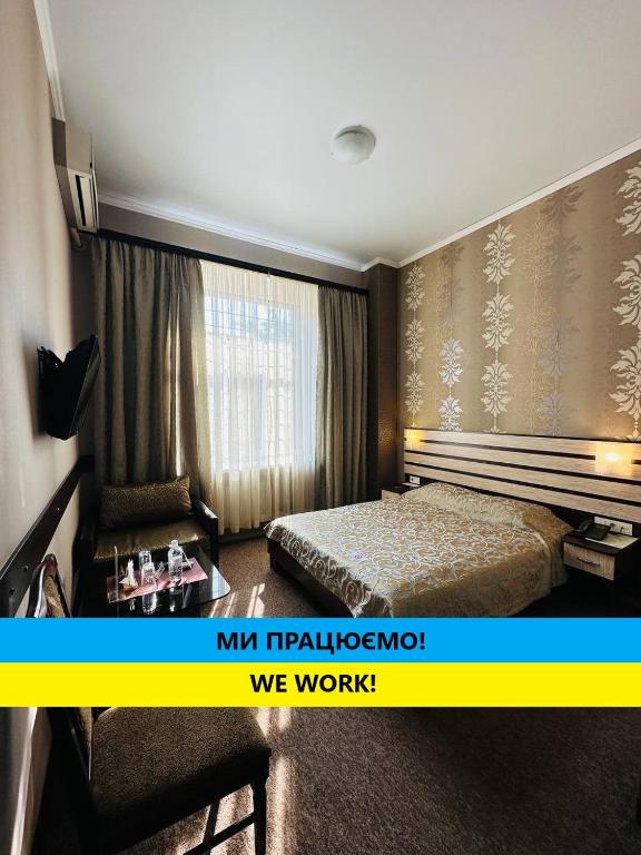 Posteľ alebo postele v izbe v ubytovaní Classic Hotel