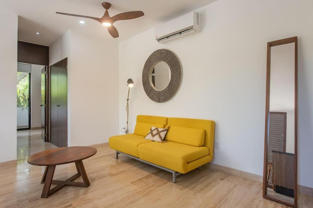 Khu vực ghế ngồi tại Amira Residence Confortable 1 BR in Aldea Zama