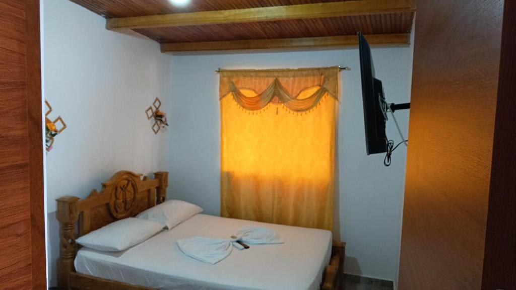 Rúm í herbergi á Hotel federal