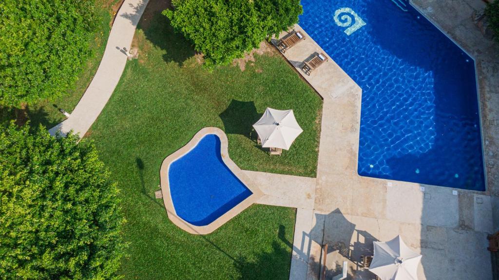 Bazén v ubytování Hotel Loma Real nebo v jeho okolí