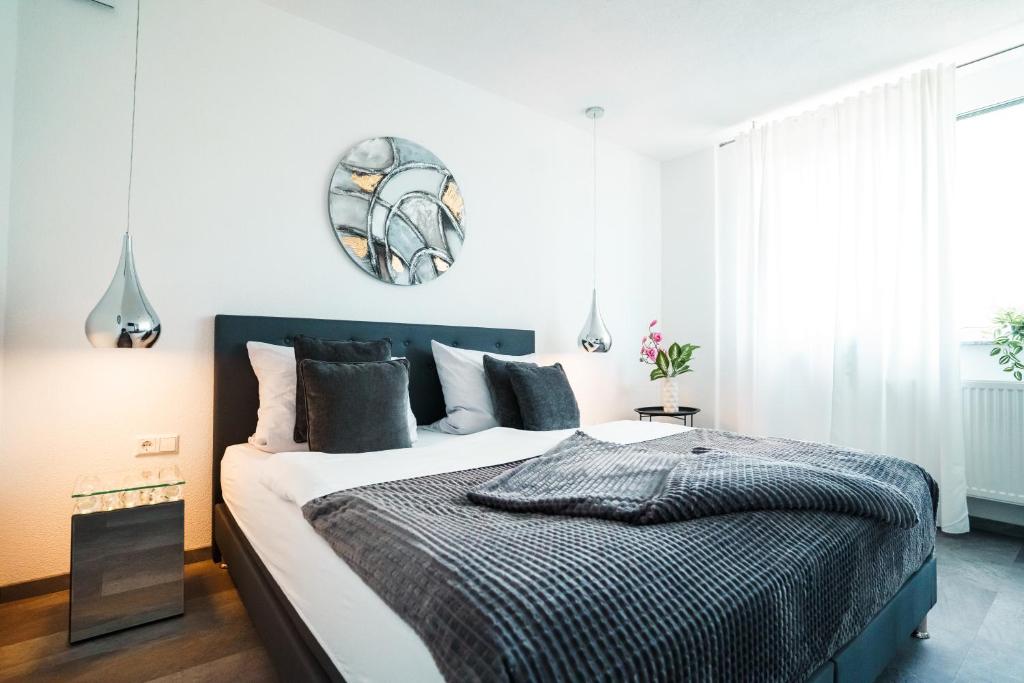 Postel nebo postele na pokoji v ubytování Hotel am Schafbaum