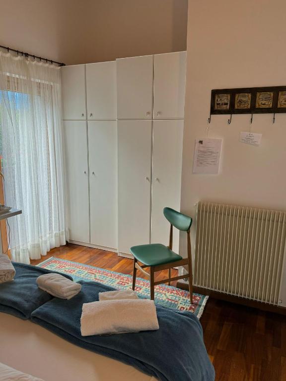 Postel nebo postele na pokoji v ubytování B&B il Ciliegio di Maura
