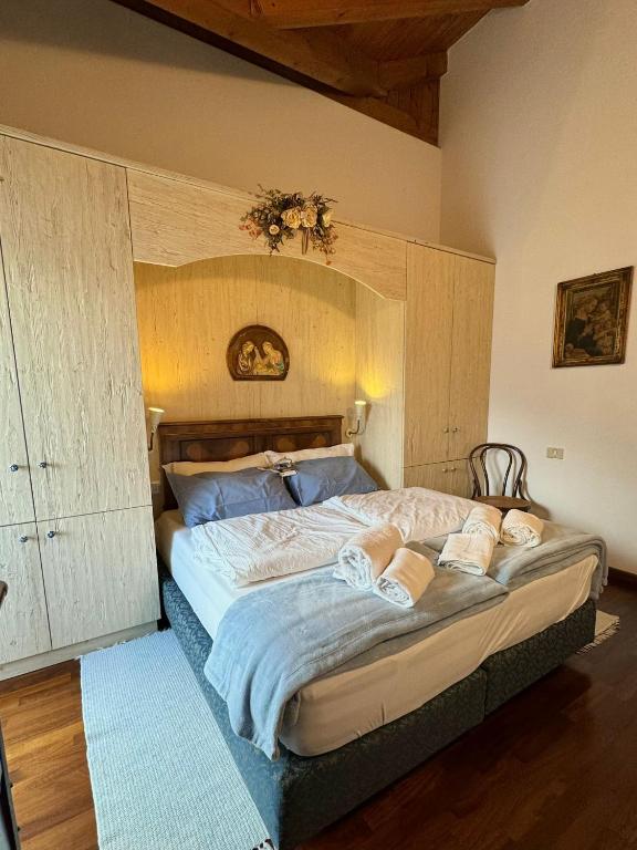 Postel nebo postele na pokoji v ubytování B&B il Ciliegio di Maura