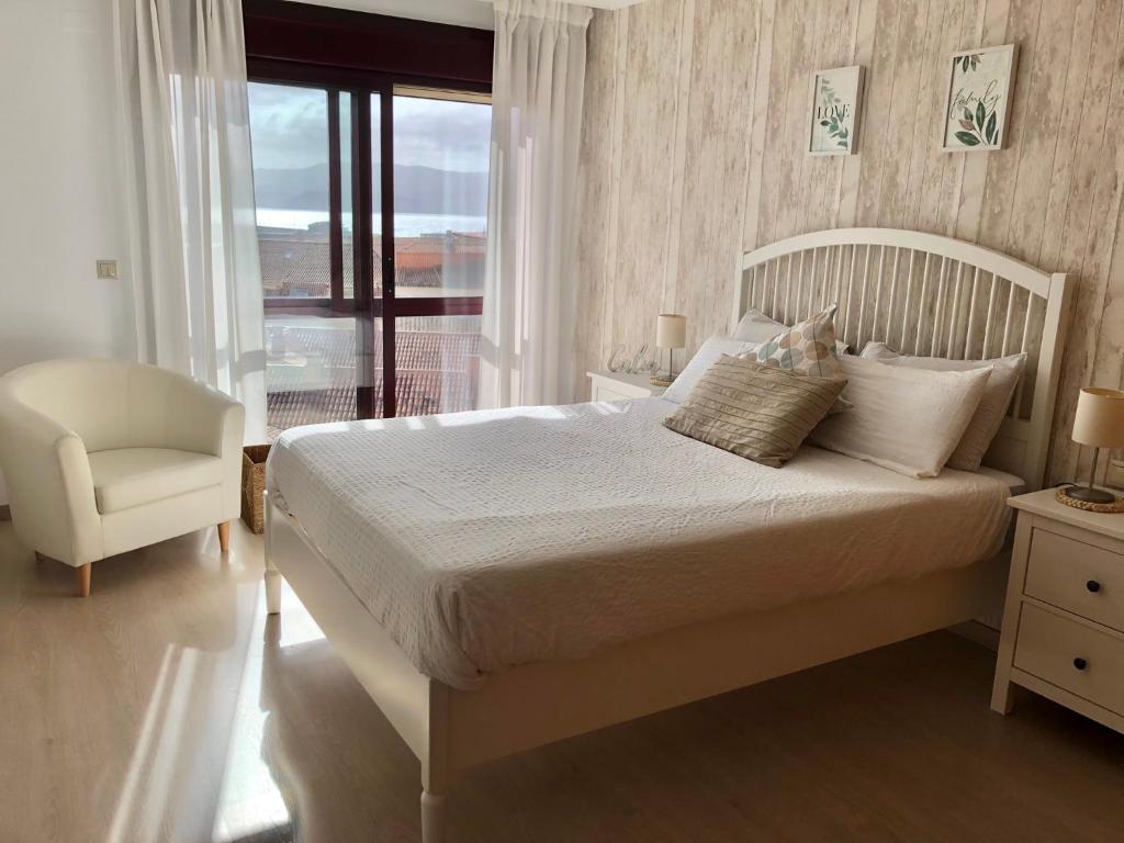 Posteľ alebo postele v izbe v ubytovaní Piso Silgar Sanxenxo