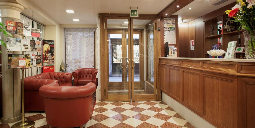 Posezení v ubytování Hotel Commercio & Pellegrino