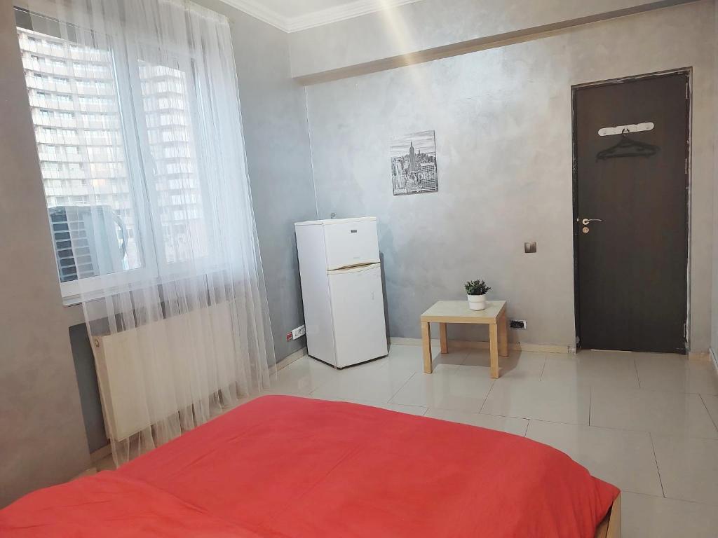 Postel nebo postele na pokoji v ubytování Old town Bucharest- Shared Apartment