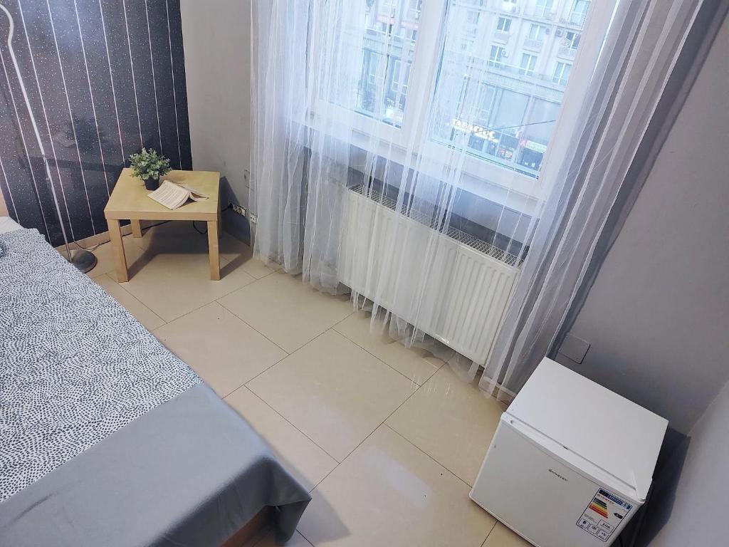 Postel nebo postele na pokoji v ubytování Old town Bucharest- Shared Apartment