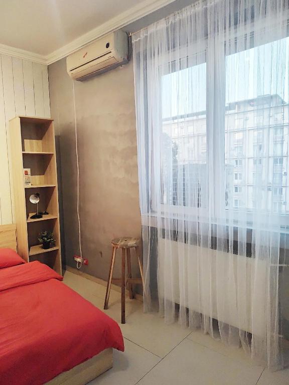 Postel nebo postele na pokoji v ubytování Old town Bucharest- Shared Apartment