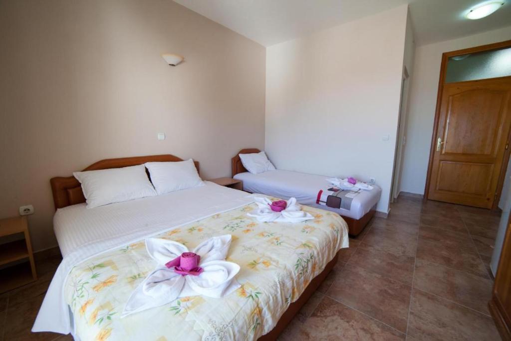 Postel nebo postele na pokoji v ubytování L&I Villa