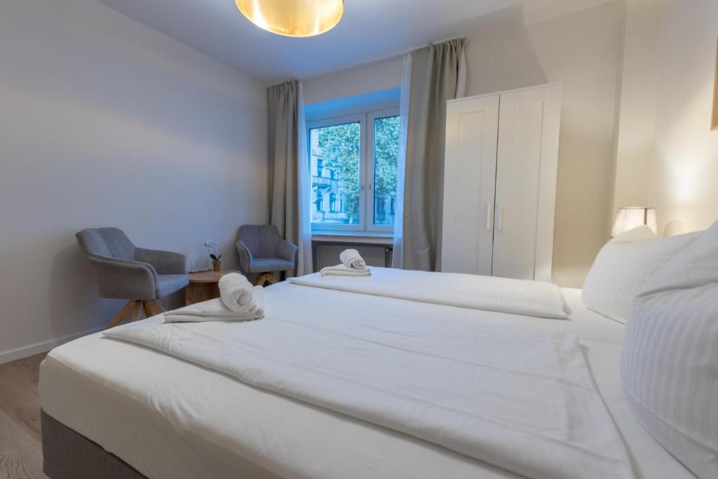 Postel nebo postele na pokoji v ubytování Hotel Doerenkamp - Digital Access