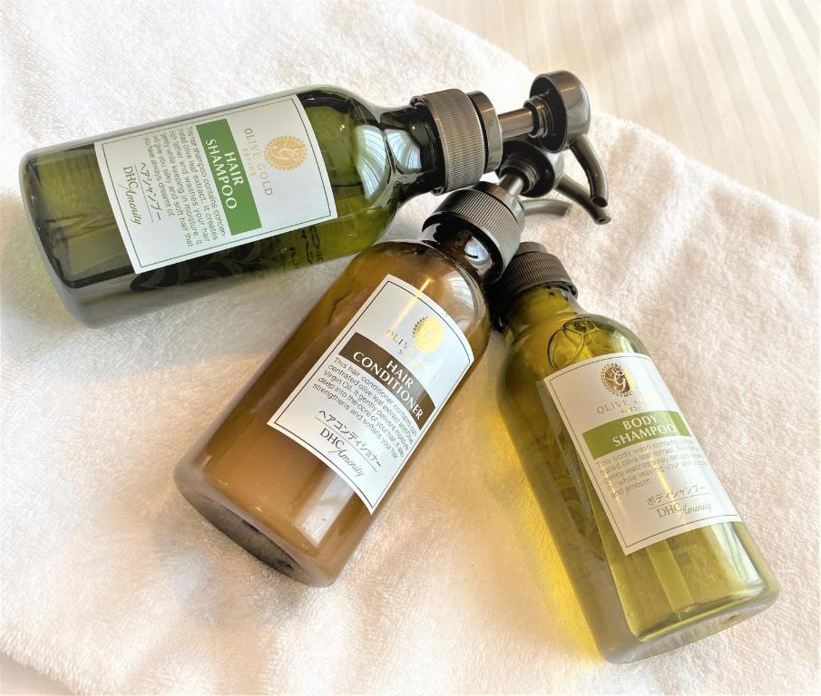 two bottles of wine sitting on a towel at Hotel Mystays Premier Akasaka in Tokyo