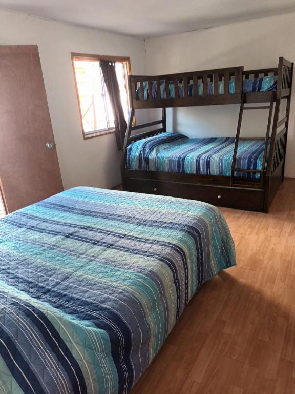 Postel nebo postele na pokoji v ubytování Hostal Al Yaras