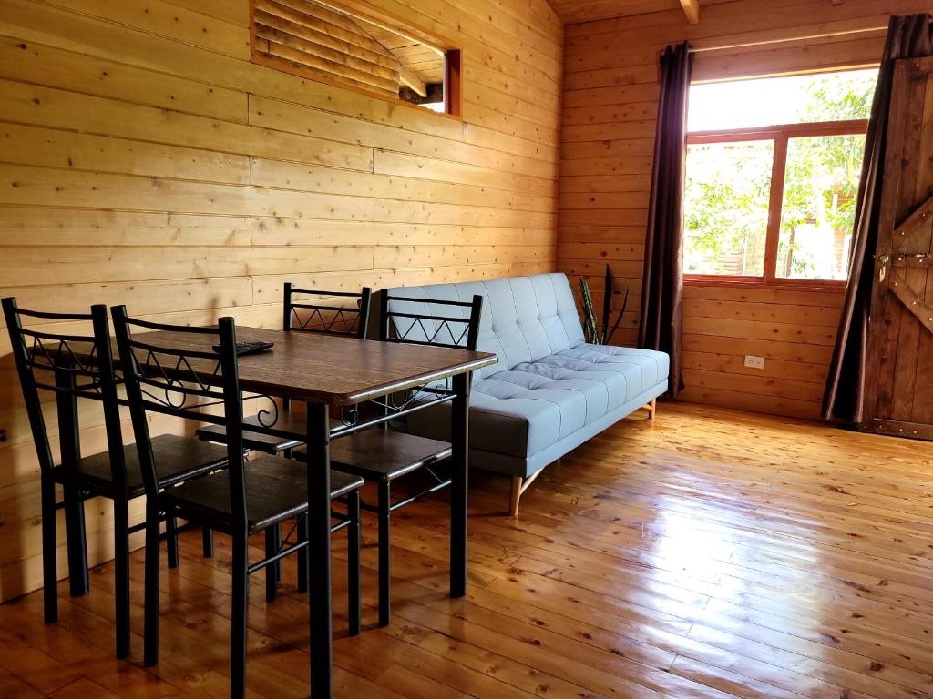Postel nebo postele na pokoji v ubytování Cabañas Barú Dota