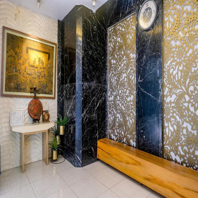 Koupelna v ubytování Sans Hotel Grand Omah Sastro Yogyakarta