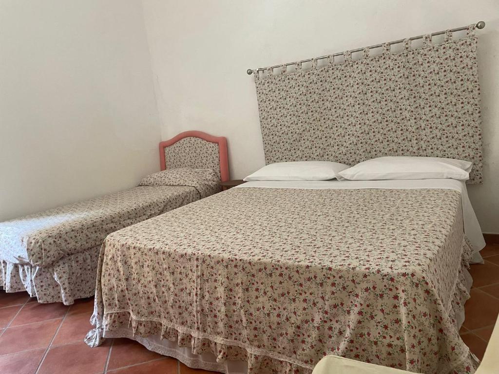 Un pat sau paturi într-o cameră la San Giorgio House