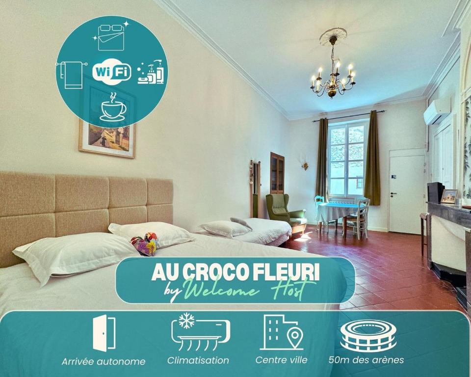 une chambre avec un lit et une salle à manger dans l'établissement Au Croco fleuri, 50m des arènes, terrasse, à Nîmes