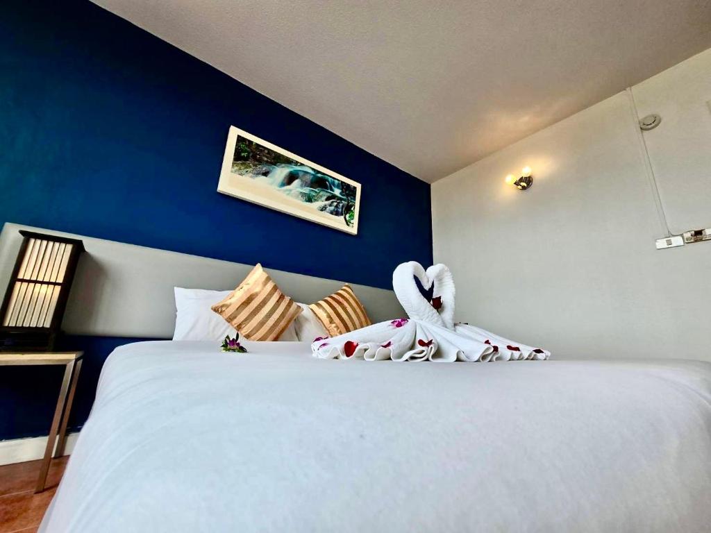 Postel nebo postele na pokoji v ubytování ON Hotel Phuket - SHA